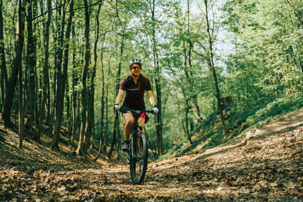 istock Women is riding on bicycle. 1181231387