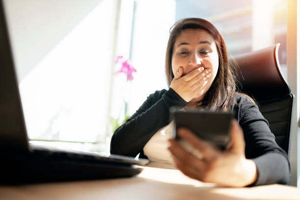 istock Businesswoman using calculator 1181238437