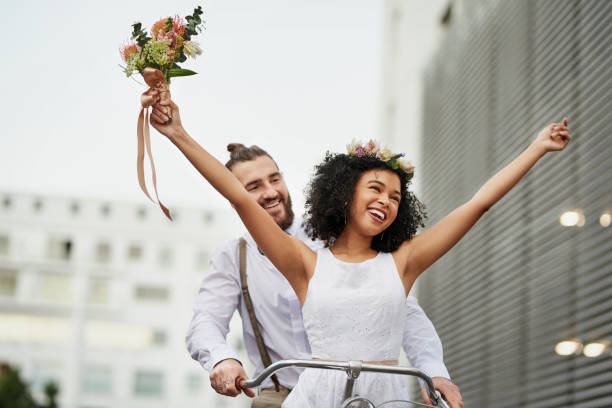 may our marriage take us to beautiful places - bride wedding freedom arms raised imagens e fotografias de stock