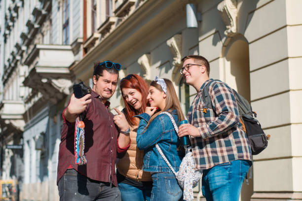 istock Happy multiracial friends group taking selfie 1181240833