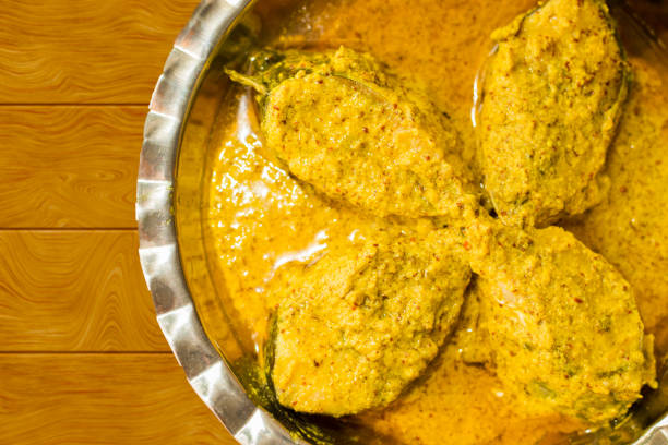 istock Ilish or Hilsa famous bengali fish curry with grinded mustard seed 1181241551