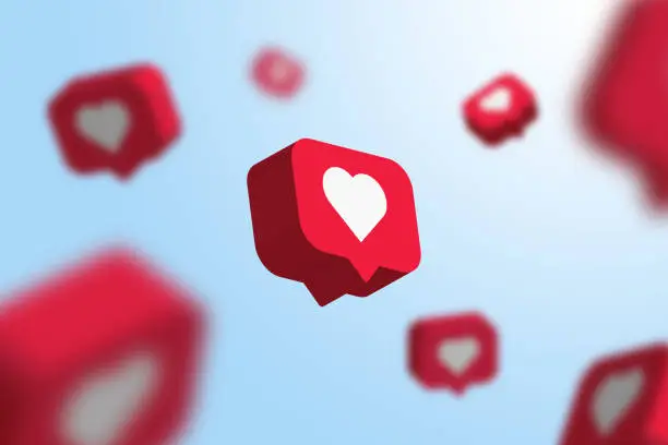 Photo of Red social media notification like icon falling . Follow, comment, like icon. - 3D Rendering