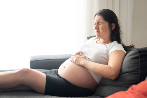 istock Pregnant is having pains 1181244418