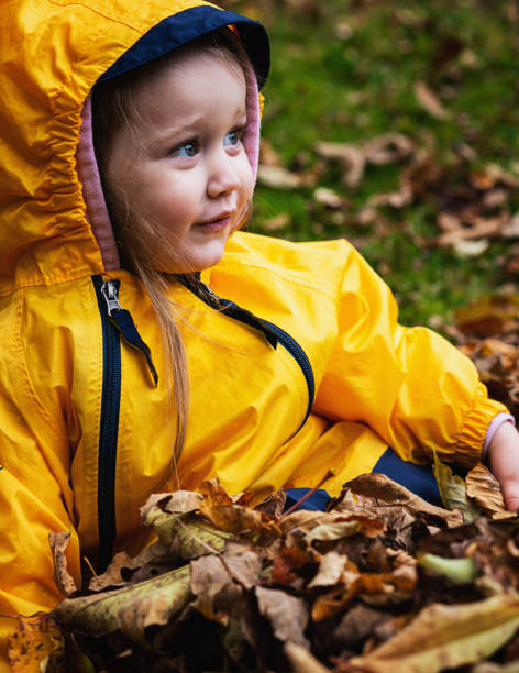 istock Girl Plays in Leaves 1181245264
