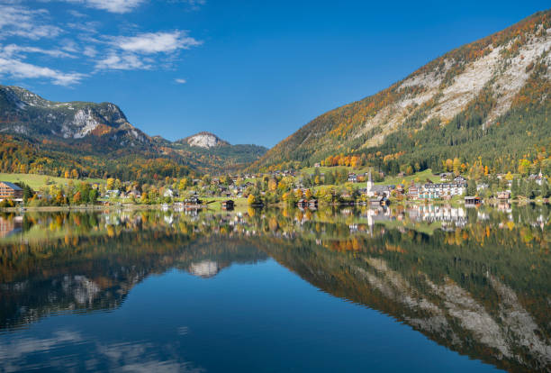Panorama of the calm Lake Altaussee on a beautiful autumn day. Austrian Alps Panorama. You can see the Mountain Sandling in back. Converted from RAW.
