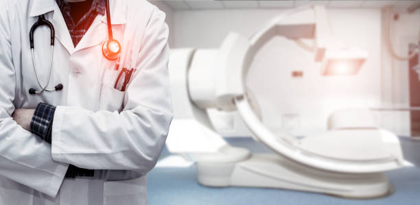 Abstract image of doctor in a white coat with a statostcope on the background of an angiograph in a modern hospital for heart surgery. Panorama. Abstract image of doctor in a white coat with a statostcope on the background of an angiograph in a modern hospital for heart surgery. Panorama. aorta photos stock pictures, royalty-free photos & images