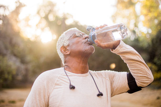 istock Senior Black Man Drinking Water 1181252852
