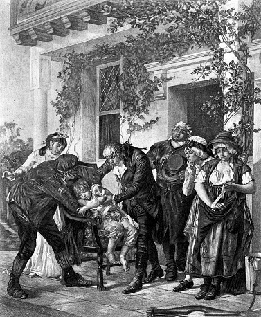 Illustration of Doctor Edward Jenner giving the world's first vaccine from 1894.