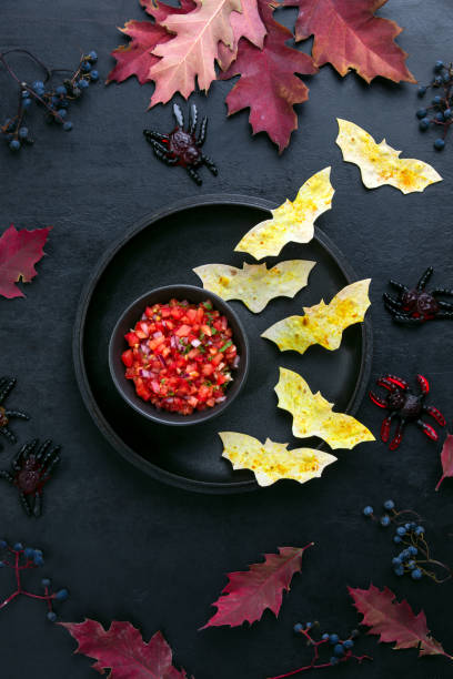 istock Halloween table setting with red salsa and bat tortillas 1181252993