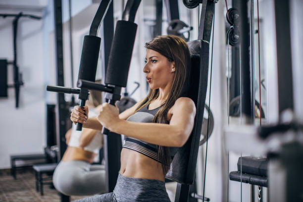istock Women exercising at the gym 1181263039