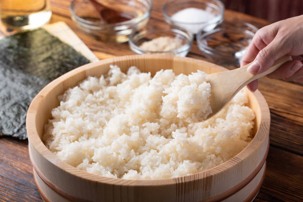 https://media.istockphoto.com/id/1181263254/photo/jaoanese-sushi-rice-in-wooden-bowl-with-ingredients.jpg?s=612x612&w=0&k=20&c=BcbfE73dlYXclI2qLo1-cunk5XsjpcTK0T_jtW2QrP0=