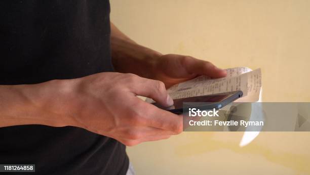 Scanning A Qr Code From A Receipt Smartphone App For Online Expense Tracking Budget And Personal Finance App Frugal Living Saving Money Stock Photo - Download Image Now