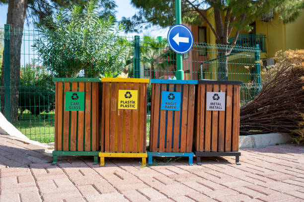 istock in a street there are different coloured bins to separate the garbage 1181265119