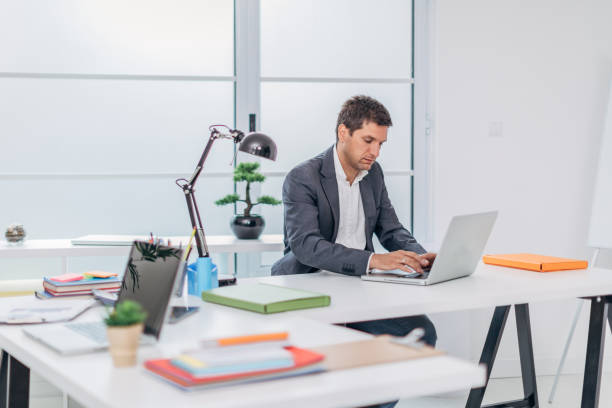 istock Businessman working at the office 1181266183