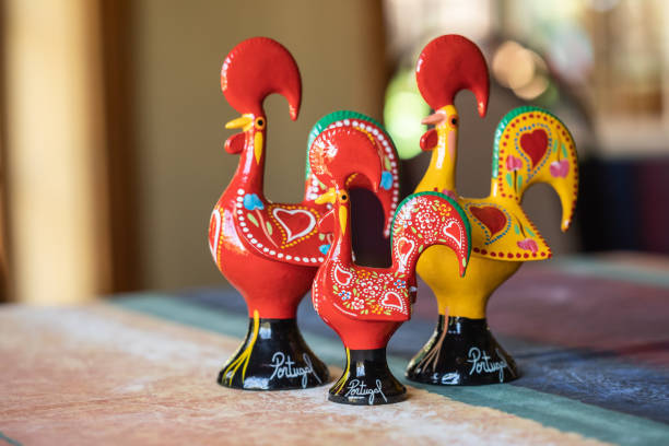 Barcelos grid Portuguese ceramics, Barcelos cock, rooster, on a table, Galo de Barcelos art and craft product stock pictures, royalty-free photos & images