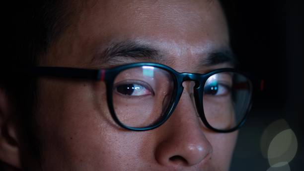 istock Closeup of man's eyes at night 1181271040