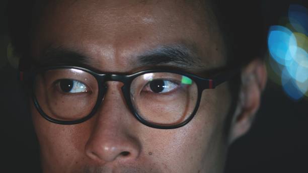 istock Closeup of man's eyes at night 1181271245