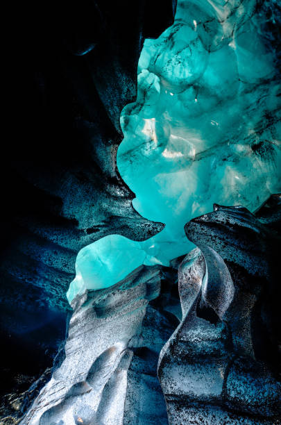 istock Blue crystal ice cave, underground beneath the glacier in Iceland 1181274345