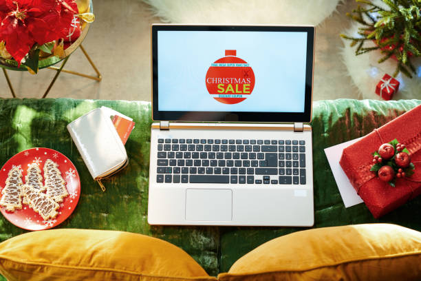 istock laptop with Christmas discount coupon 1181274522