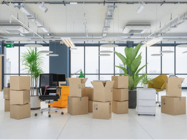Carton Boxes In Empty Office. Moving Office Concepts.