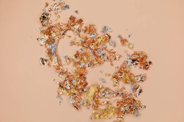 istock Sparkling foil on trendy cream background 1181275598