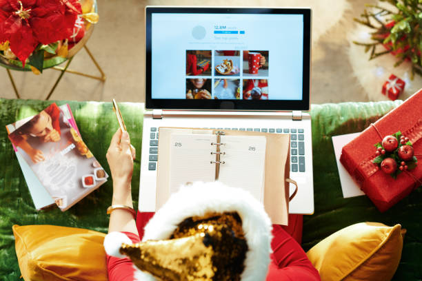 istock female planning festive dinner and looking for recipes online 1181275604