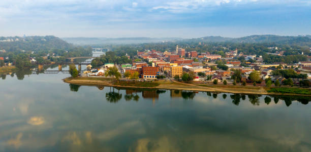 Foggy Morning Over the River and Main Street Marietta Ohio Washington County A scenic byway feeds tourists into the downtown area in the settlement called Marietta in Ohio State ohio river photos stock pictures, royalty-free photos & images