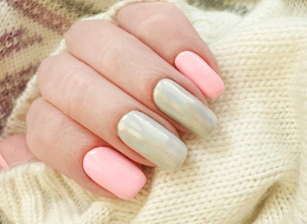 istock female hand manicure beautiful sweater 1181280202