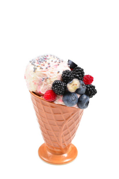 istock Ice cream with blueberries, blackberries and raspberries on a white background.  Copy space. 1181282503