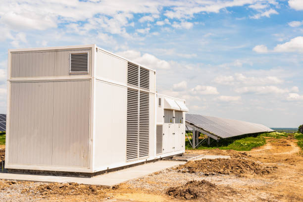 istock Transformer and inverter on solar panels background 1181282808
