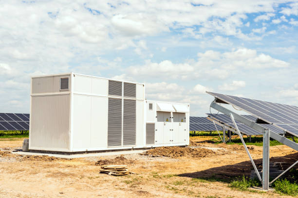 istock Transformer and inverter on solar panels background 1181282823