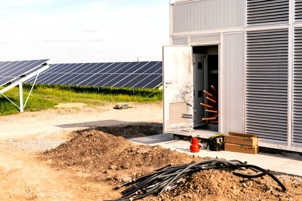 istock End cable clutches in transformer on solar panels background 1181282872