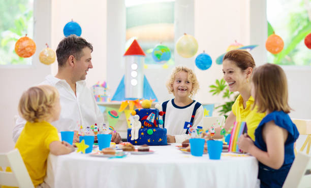 istock Kids space theme birthday party with cake. 1181287122