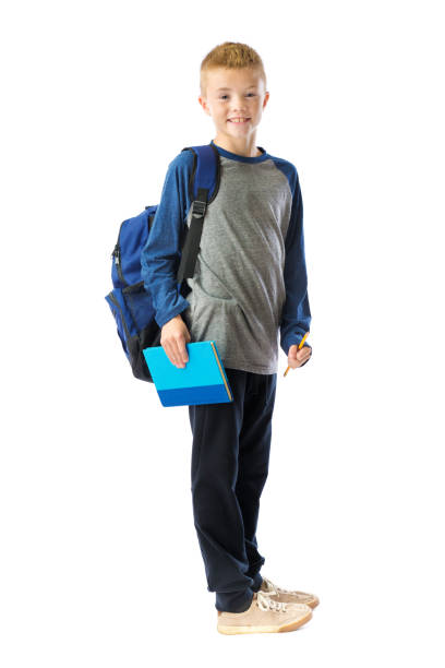 istock Happy Caucasian School Boy on White Background 1181287711