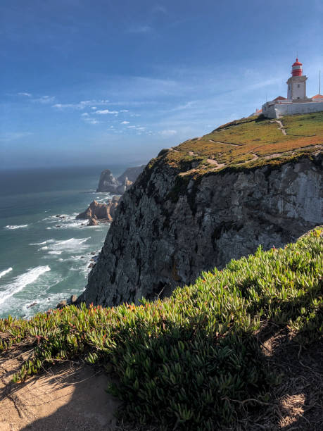View over Atlantic ocean coast and lighthouse, Cabo da Roca, Portugal