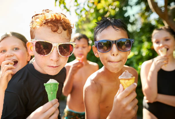 istock Cool kids with ice cream 1181298688