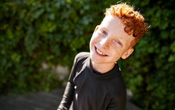 istock Little boy with crazy facial expression 1181299398