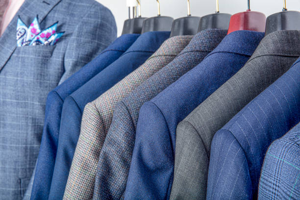 istock Men's jackets on hangers in the men's store 1181300534