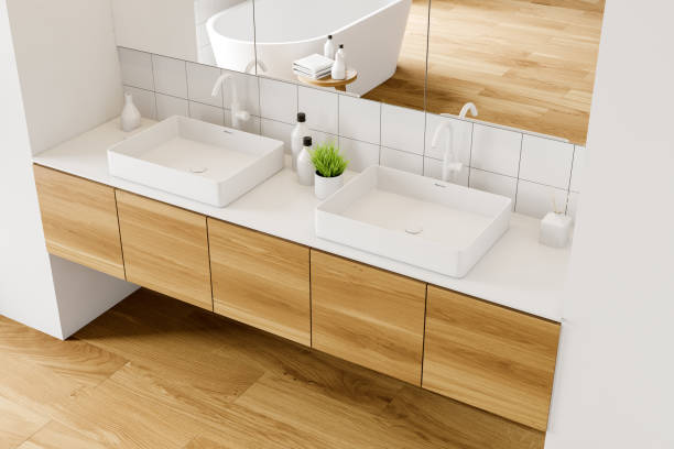 istock Top view of double sink in white bathroom 1181302081