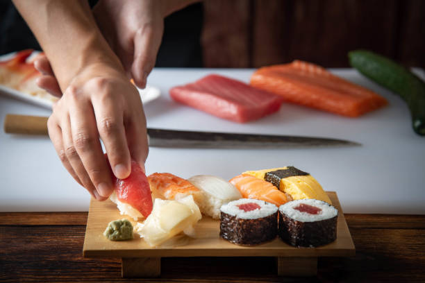 istock japanese sushi chef making nigiri sushi 1181303538