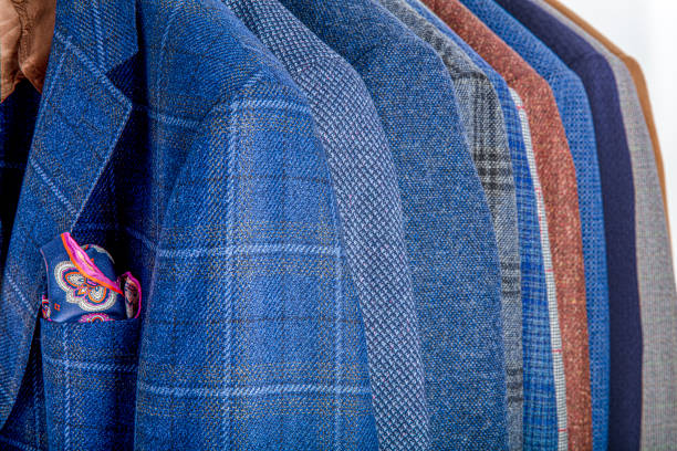 istock Men's jackets on hangers in the men's store 1181306090