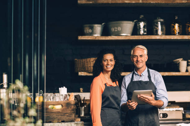 istock Smiling mature couple using a tablet together 1181308523