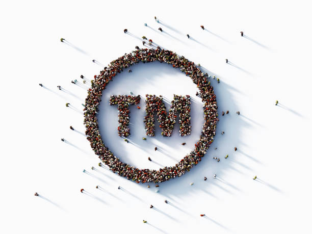 Human Crowd Forming Registered Trademark Symbol on White Background : Patent and Copyright Concept Human crowd forming trademark symbol on white background. Horizontal composition with copy space. intellectual property photos stock pictures, royalty-free photos & images