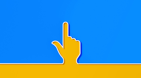 White hand shape on blue and yellow background. Horizontal composition with copy space.