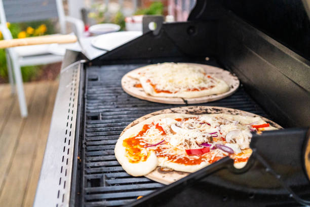 istock Preparing individual grilled pizzas 1181311972