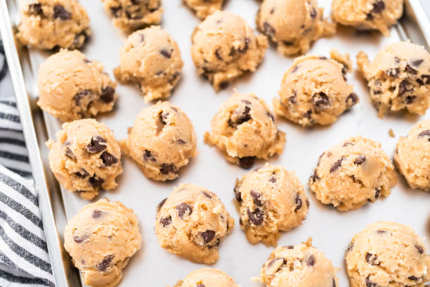 istock Homemade chocolate chip cookies dough scoops 1181311973