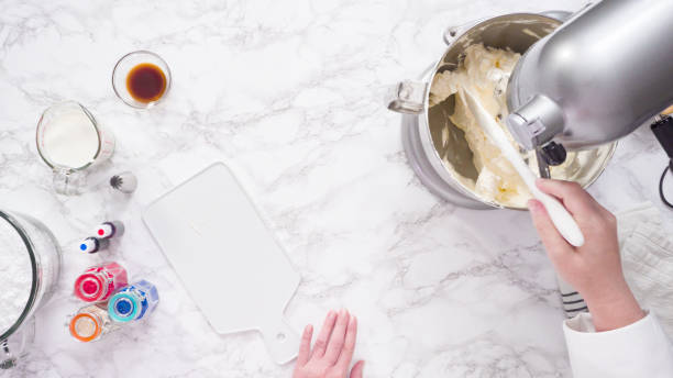 istock Mixing ingredients to make buttercream frosting 1181313814