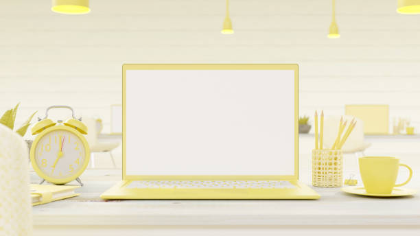 istock Yellow Laptop on work desk 1181313969