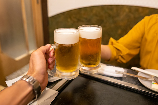 Celebratory toast at Japanese restaurant