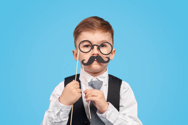 istock Little gentleman with mustache and glasses 1181317114